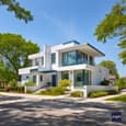 White Minimalist Duplex Elevation with Horizontal Features