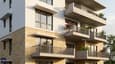 Design highlight showing east-facing facade details of 40x60 G+3 — staggered balconies, stone-clad lower floors, large east-facing windows with chajjas, and recessed third-floor penthouse