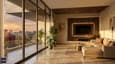 West-facing living room design showing a 6-ft chajja overhang controlling afternoon sun while admitting golden hour evening light