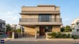 East-facing 30x40 duplex elevation — projecting first-floor balcony, stone cladding ground floor, plaster upper floor, horizontal band between floors