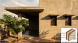 Design detail showing deep overhangs, shaded west verandah, and planted boundary screen on a west-facing home