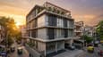 A contemporary G+3 west-facing home on a 40x60 plot with the evening facade catching golden light