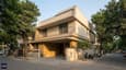 Contemporary east-facing G+1 duplex on a 30x40 plot, morning light on the facade, clean modern elevation with balcony and sit-out