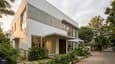 40x50 north facing 2-floor G+1 home — contemporary elevation with large north windows and floating canopy entry