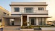 Modern south-facing 40x50 G+1 home with double-height facade and landscaped south entrance