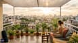 Lifestyle photograph showing a terrace on the third floor with city views, plants, and outdoor seating