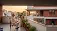 Lifestyle image: multi-generational family on the south-facing terrace at sunset, with deep overhang visible