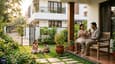 Young Indian family of four relaxing in the east-facing sit-out of their G+1 home on a weekend morning, children playing in the compound garden, parents with tea, warm golden morning light, casual and relaxed atmosphere